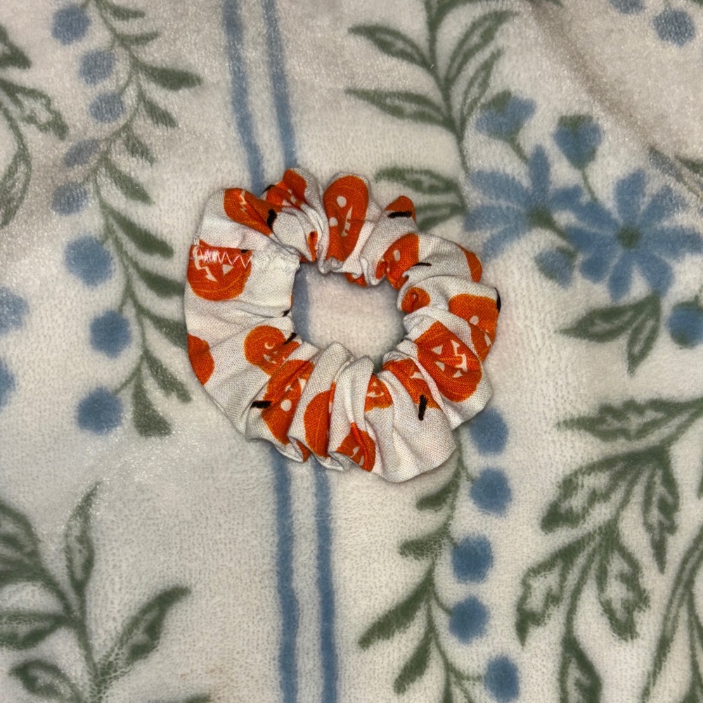 Handmade glow in the dark pumpkin mini scrunchie!